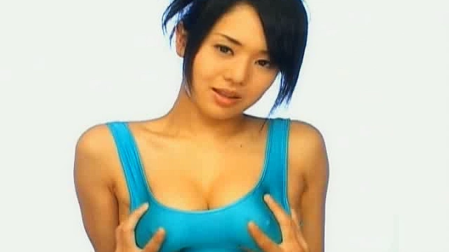 Sora Aoi plays with her massive Asian tits
