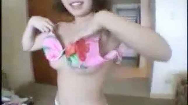 This busty japanese  is demonstrating her natural tits