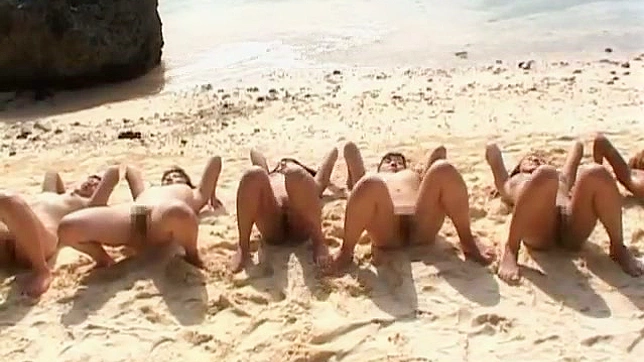 Asian girls playing weird games on the beach