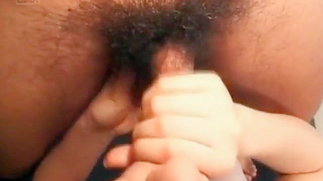 Sensual japanese girl blowing hairy cock in close-up