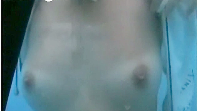 This sporty and sexy doll with perky jugs is taking shower