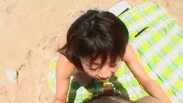 Nasty and daring teen is giving blowjob on the beach