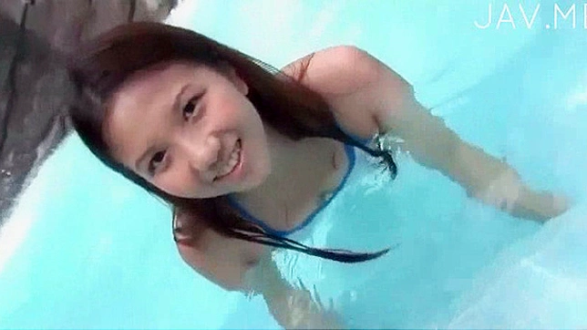 Gorgeous teen in bikini is swimming in the l outdoors
