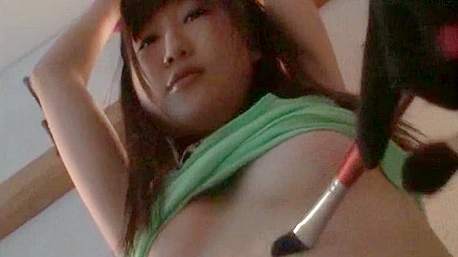 Japanese teen with tied hands is posing her beauty body