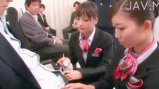 Beautiful japanese stewardesses are sucking erection