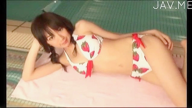 Amateur and pretty japanese girl in bikini is posing her body