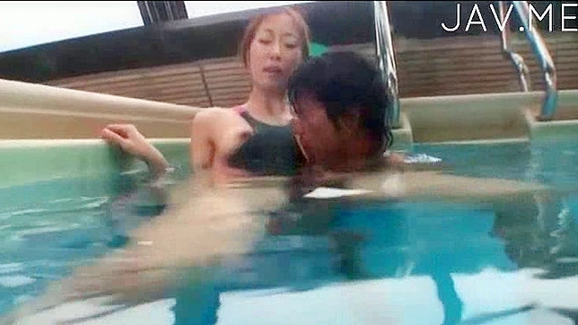 Indecent pleasuring for Japanese babe inside a swimming l