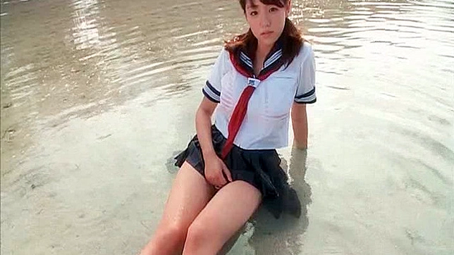 Sexy body showing of a young Japanese chick outdoors