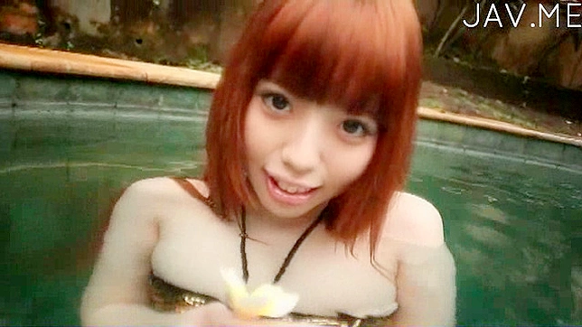 Lovely Japanese shows off her hot body in bikini during a swim