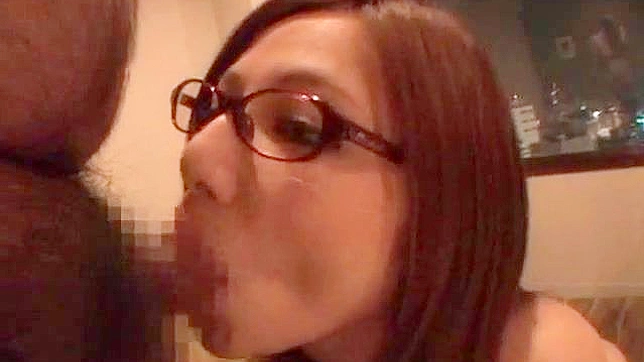 Brunette with glasses swallows a strong hairy cock