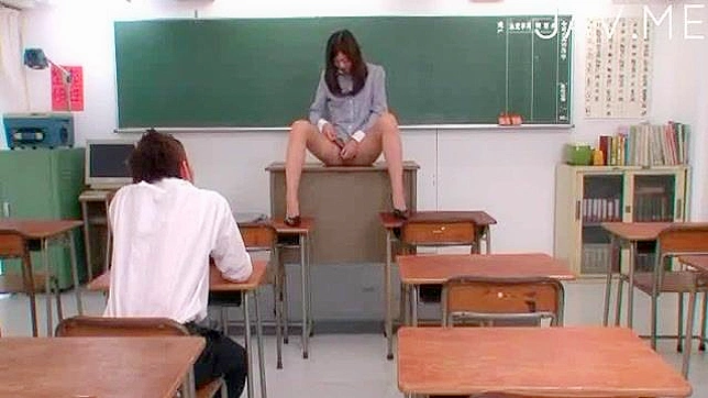 Horny teacher masturbates pussy in front of student