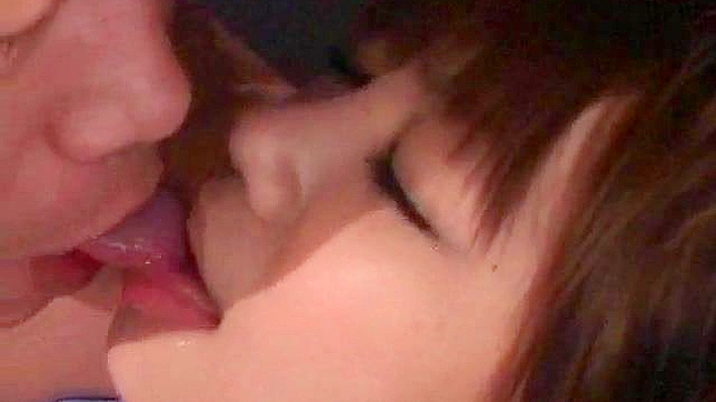 Stimulating Japanese chick's twat with sex toy and fingering