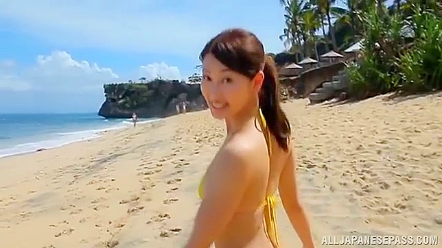 Asian darling shares her hot body in bikini at the beach