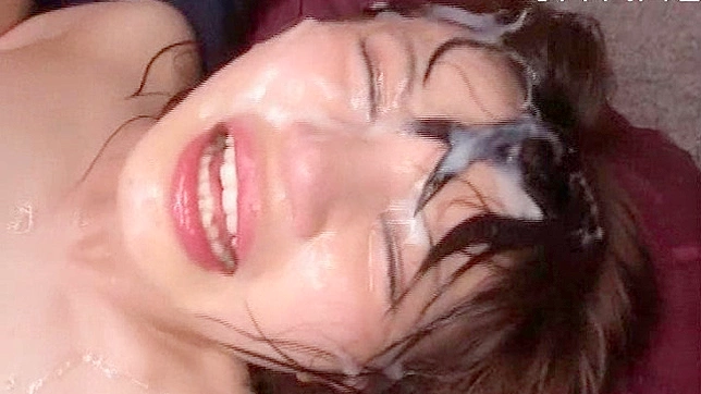 Asian babe's face is covered with cumshot after wild drilling