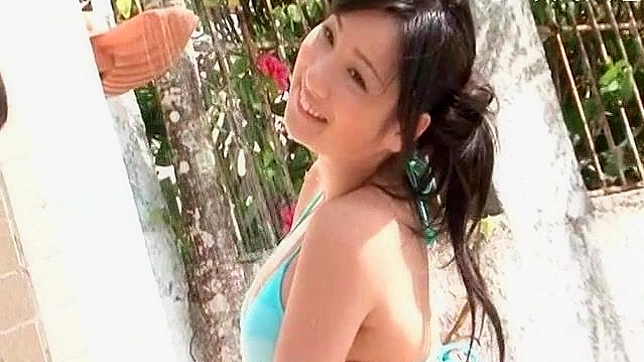 Horny and captivating Asian chick washes car in her hot bikini