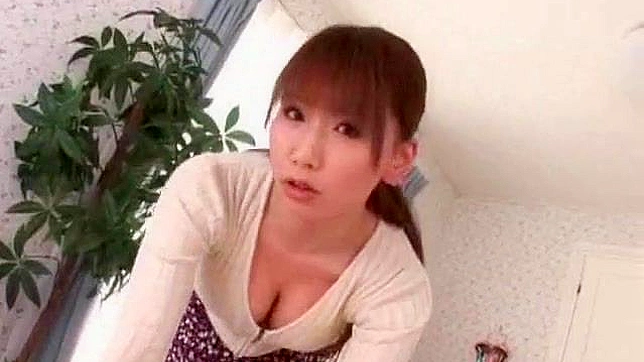 Naughty Asian chick is serving gigantic boobs at the kitchen