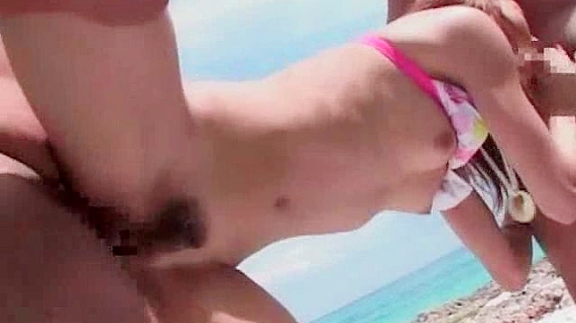 Raunchy beach threesome for demure Japanese chick