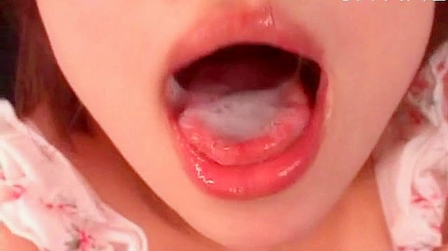 Sweet Japanese darling is happy to receive jizz in her mouth