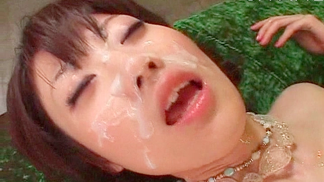 Japanese darling delights with naughty phallus sucking