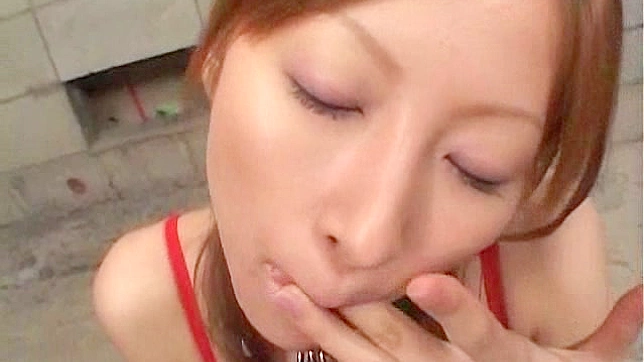 Appealing japanese  with red hair is giving amazing blowjob