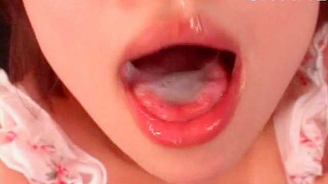 Cute japanese cock sucker with beauty eyes is giving blowjob