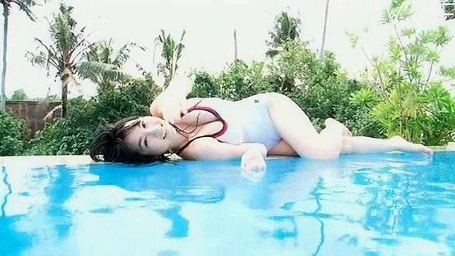 Pleasing and whimsical asian solo teen is posing outdoors
