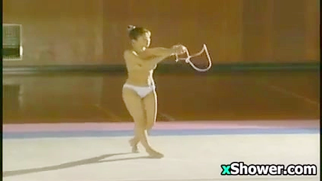 Asian Athlete Performs Topless