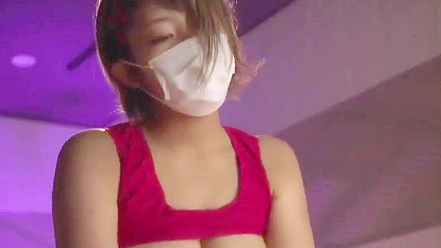Busty Japanese is working hard for a creampie as she is wearing a face mask