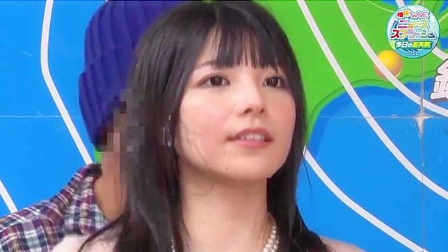 Japanese TV newscaster talks about the weather as she is fingered and fucked
