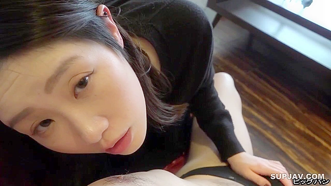 Japanese whore in stockings gets a rain of cum on her face fucking on the couch