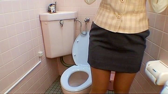 Hidden Cam Captures Japanese Office Lady Masturbating in the Restroom Before Work