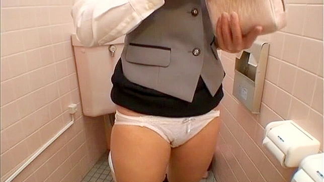 Office Lady Discreetly Pleasuring Herself in the Bathroom Caught On Hidden Camera