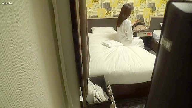 Japanese Woman Unaware as Voyeur Sets Up Secret Camera to Record Masturbation in Hotel Room