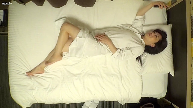 Japanese Woman Unaware as Voyeur Sets Up Secret Camera to Record Masturbation in Hotel Room