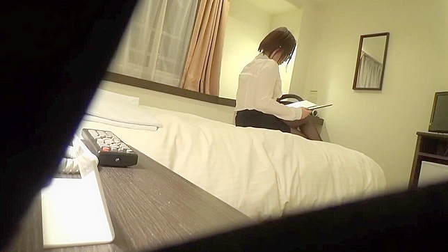 Voyeur Captures Japanese Woman Unaware as She Masturbates in Hotel Room with Hidden Camera