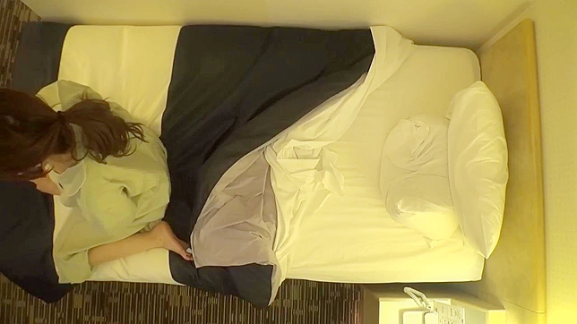 Voyeur Installs Secret Camera to Capture Japanese Woman Masturbating in Hotel Room