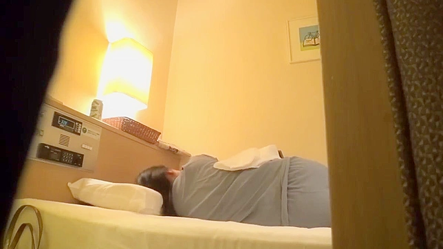 Voyeur Installs Spy Cam to Record Japanese Woman Masturbating in Hotel Room