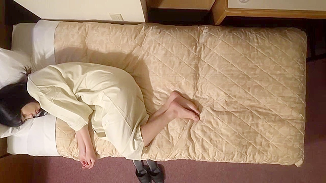 Japanese Woman Unaware as Voyeur Installs Hidden Camera to Catch Her Masturbation in Hotel Room