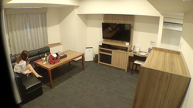 Voyeur Catches Office Lady Engaging in Self-Pleasure on Spy Cam in Hotel Room