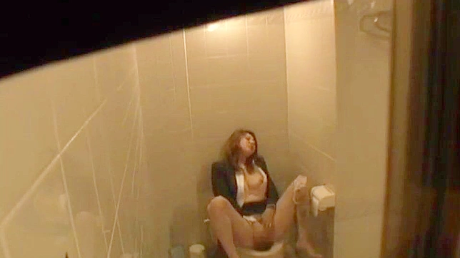 Unveiling a Japanese Mom's Slutty Self-Gratification via Hidden Toilet Camera