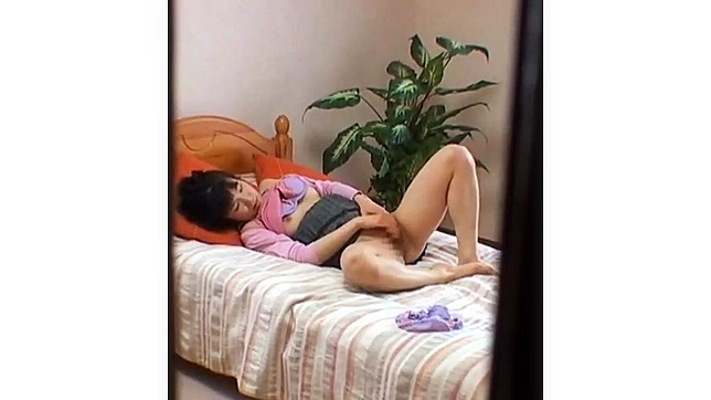 Sweet Japanese Girl Caught Self-Pleasuring on a Hidden Cam