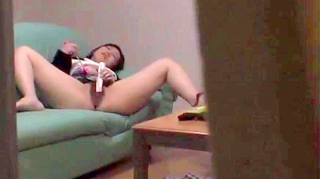 Spy Cam Uncovers Sweet Japanese Girl Enjoying Self-Pleasure
