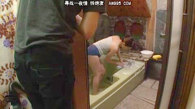 Mature Oriental Friend Gives Blowjob in Steamy Bathroom