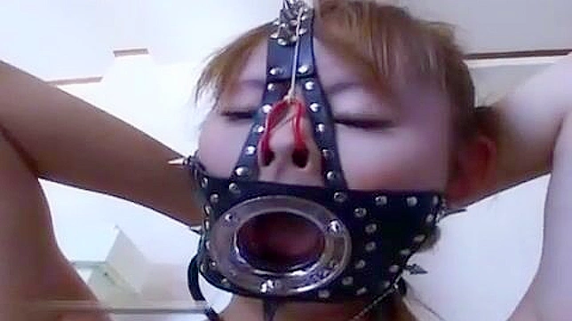 Nippon Submissive in Gagged Frenzy, Deepthroating Master Cock