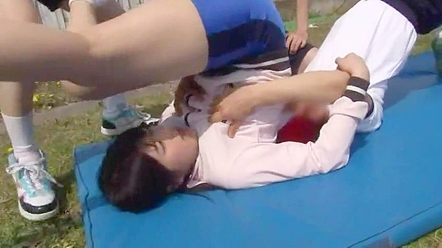 Unable to resist her students' seduction, this Oriental physical teacher gets fucked in a field