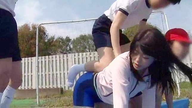 Unable to resist her students' seduction, this Oriental physical teacher gets fucked in a field