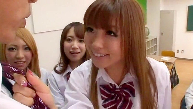 Asian Schoolgirls' Wild Romp with Teacher in Classroom