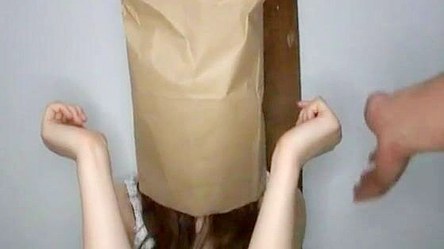 Asian Porn Video - Exploring the Art of Face Fucking with a Paper Bag