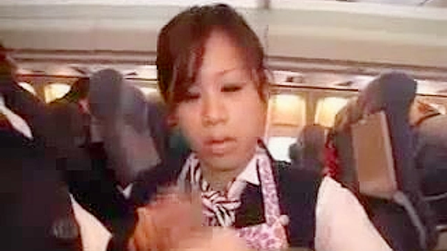 Japanese Stewardess Gives Hot Handjob on Plane