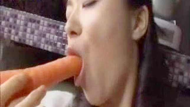 Sexy Oriental housewife vegetable playtime in kitchen